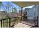 View from the deck overlooking a landscaped backyard with flowering trees at 213 Yellow Poplar Ave, Wake Forest, NC 27587
