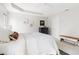 Spacious bedroom featuring carpet, neutral paint, white bedding, and a decorative tray ceiling at 2325 Old Oak Pl, Hillsborough, NC 27278