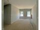 Unfinished bedroom with multiple windows providing natural light at 247 Meadowbark Bnd # 29, Garner, NC 27529