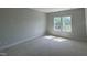 Bedroom featuring a large window providing lots of natural light at 247 Meadowbark Bnd # 29, Garner, NC 27529