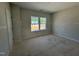 Unfinished bedroom with a double window providing natural light at 247 Meadowbark Bnd # 29, Garner, NC 27529