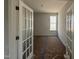 Office area with glass panel doors and a large window at 247 Meadowbark Bnd # 29, Garner, NC 27529