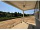 Covered back patio with a ceiling fan and a view of the backyard at 247 Meadowbark Bnd # 29, Garner, NC 27529