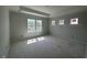 Bedroom view showcasing a tray ceiling, natural light from several windows, and neutral walls at 251 Meadowbark Bnd # 30, Garner, NC 27529
