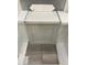 Sample of neutral-colored flooring, cabinet door, and decorative tile at 251 Meadowbark Bnd # 30, Garner, NC 27529
