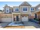 Charming townhome with brick accents, a single-car garage, and inviting front door at 2822 Casona Way, Raleigh, NC 27616