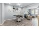 Comfortable living space featuring a dining table and view into the seating area at 2822 Casona Way, Raleigh, NC 27616