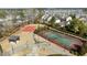 Aerial view of tennis courts, a pavilion, and walking paths in a well-maintained community at 2822 Casona Way, Raleigh, NC 27616