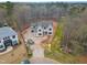 Aerial view of a home under construction on a large lot surrounded by bare trees at 2916 Frances Marie Ln, Raleigh, NC 27603