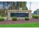 Stone sign displays the name of the Sanctuary at Lake Wheeler community at 2916 Frances Marie Ln, Raleigh, NC 27603