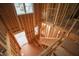 Interior view of a home under construction, showcasing the framing and layout with stairs and high ceilings at 2916 Frances Marie Ln, Raleigh, NC 27603