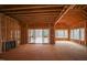 Open interior view of a home under construction featuring a fireplace and large windows at 2916 Frances Marie Ln, Raleigh, NC 27603