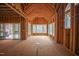 Spacious interior view of a home under construction featuring the wooden frame and window placements at 2916 Frances Marie Ln, Raleigh, NC 27603