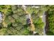 An aerial view of the property featuring mature trees and neighboring homes at 2968 Tram Rd, Fuquay Varina, NC 27526