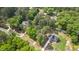 This aerial view highlights properties surrounded by mature trees, creating a serene and private environment at 2968 Tram Rd, Fuquay Varina, NC 27526