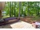 Spacious backyard featuring a large deck with plenty of room for outdoor seating and entertaining at 2968 Tram Rd, Fuquay Varina, NC 27526
