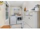 Well-organized laundry room with modern washer and dryer and ample storage space at 2968 Tram Rd, Fuquay Varina, NC 27526