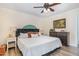Comfortable bedroom with a queen bed, stylish decor, and warm lighting, creating a relaxing atmosphere at 2968 Tram Rd, Fuquay Varina, NC 27526