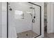 Modern bathroom shower with black trim and white subway tile at 298 Bonterra Way, Chapel Hill, NC 27516