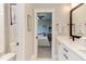Elegant bathroom featuring a double vanity, modern fixtures, and access to the bedroom at 298 Bonterra Way, Chapel Hill, NC 27516