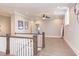 Upstairs hallway area with decorative surfboard at 298 Bonterra Way, Chapel Hill, NC 27516