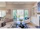 Comfortable living room with sliding glass doors to deck and stylish furnishings at 298 Bonterra Way, Chapel Hill, NC 27516