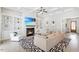 Bright living room boasts built-in bookshelves, a fireplace and large windows at 298 Bonterra Way, Chapel Hill, NC 27516