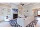 Bright living room boasts built-in bookshelves, a fireplace and large windows at 298 Bonterra Way, Chapel Hill, NC 27516