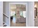 Open-concept living space with dining area, cozy seating, and abundant natural light at 298 Bonterra Way, Chapel Hill, NC 27516