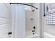 Stylish bathroom shower featuring modern fixtures, marble tile surround, and ample space at 298 Bonterra Way, Chapel Hill, NC 27516