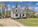 Charming home featuring a well-manicured lawn, tidy landscaping, and a welcoming driveway at 305 Dickens Rd, Fuquay Varina, NC 27526