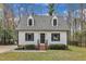 Beautifully maintained two-story home with black shutters and mature landscaping at 305 Dickens Rd, Fuquay Varina, NC 27526