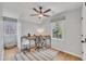 Bright home office with streamlined desk, modern office chair, and natural light at 305 Dickens Rd, Fuquay Varina, NC 27526