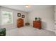 Spare bedroom featuring neutral paint, plush carpet and window with view at 309 Orange Blossom Ct, Wake Forest, NC 27587