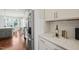 Modern kitchen featuring stainless steel appliances, white cabinets, and stylish countertops at 309 Orange Blossom Ct, Wake Forest, NC 27587