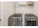 Laundry room with modern washer and dryer units at 309 Orange Blossom Ct, Wake Forest, NC 27587