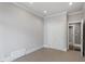 Neutral bedroom with carpet flooring and built in storage at 321 E Lane St, Raleigh, NC 27601