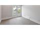 Bedroom with french doors leading to outdoor space at 321 E Lane St, Raleigh, NC 27601
