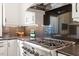 Gourmet kitchen with stainless steel appliances, granite countertops, and custom cabinetry at 321 E Lane St, Raleigh, NC 27601