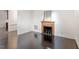 Living room featuring hardwood floors, white walls, and an ornate fireplace at 321 E Lane St, Raleigh, NC 27601