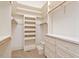 Walk-in closet with custom shelving and ample storage at 321 E Lane St, Raleigh, NC 27601