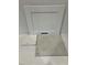 Sample board showcasing white kitchen cabinet door, countertop, and flooring materials at 340 Chesapeak Commons St # 139, Garner, NC 27529