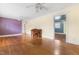 Spacious living room featuring hardwood floors, neutral walls, with an opening to additional rooms at 3617 Cranston Rd, Garner, NC 27529