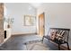 Sunlit foyer with large window, modern seating, and sleek tiled floor at 380 Wesley Ct, Chapel Hill, NC 27516