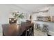 Bright kitchen connects to the dining area and living room beyond at 402 Abbott Dr, Sanford, NC 27330