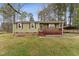 Charming home with a inviting front porch and brick foundation at 402 Abbott Dr, Sanford, NC 27330