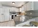 This kitchen offers modern appliances, granite countertops and an eat-in bar at 402 Abbott Dr, Sanford, NC 27330