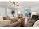 Open-concept living room seamlessly connects to kitchen, dining, and other living spaces at 402 Abbott Dr, Sanford, NC 27330