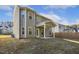 Spacious backyard with covered patio, perfect for outdoor entertaining and relaxation at 42 Chris Todd Way, Angier, NC 27501