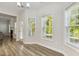 Bright dining area with hardwood flooring and direct access to the backyard at 42 Chris Todd Way, Angier, NC 27501